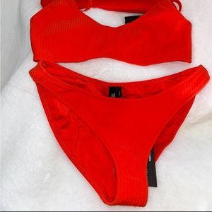 Brand new bikini with wet bag.